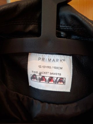 Cazadora polipiel negra Primark T. 12-13