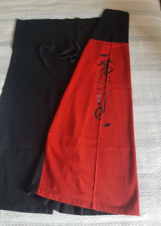 Pantaloni Stev neri e rossi