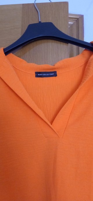 Blazer sin mangas naranja mujer
