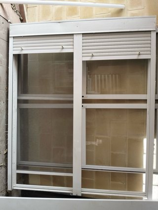 Puerta doble aluminio 180x227 con persiana Ganga