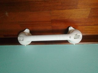 Agarrador de baño con ventosas