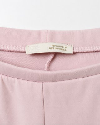 Pantalón Zara rosa acampanado
