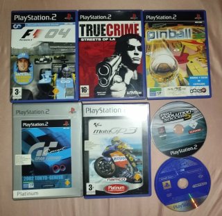Consola PlayStation 2 + juegos+mandos+soporte