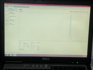 Portátil Dell Latitude con recargador, raton