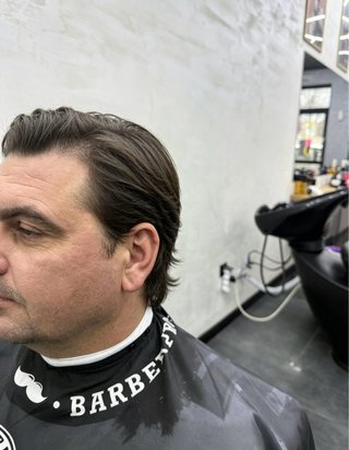 Men’s barber haircut and beard trim
