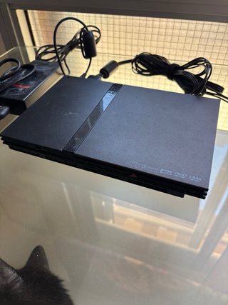 PlayStation 2 Slim + 3 mandos