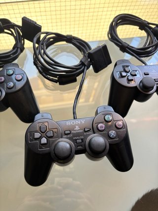 PlayStation 2 Slim + 3 mandos