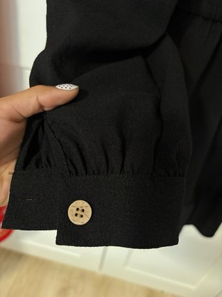 Vestido negro con lazada