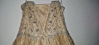 Vestido de 15 años dorado y plateado