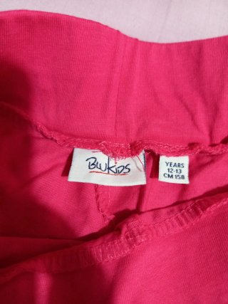 Pantaloncini fucsia con bordi neri