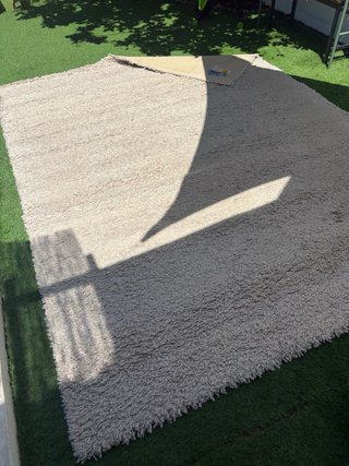 Alfombra beige tamaño extra grande