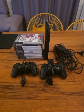 Lote PlayStation 2 con 2 mandos y 10 juegos