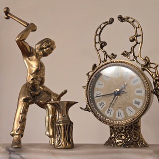 Reloj Bronce y Mármol Forjador