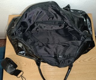 Bolso de viaje negro brillante