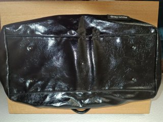 Bolso de viaje negro brillante