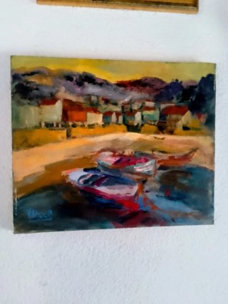 Pintura al óleo de barcos y pueblo