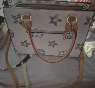 Bolso de mano verde y dorado