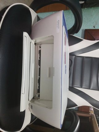Impresora HP azul y blanca
