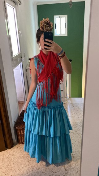 Traje de flamenca azul con volantes