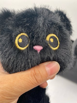 Peluche gato negro con cola