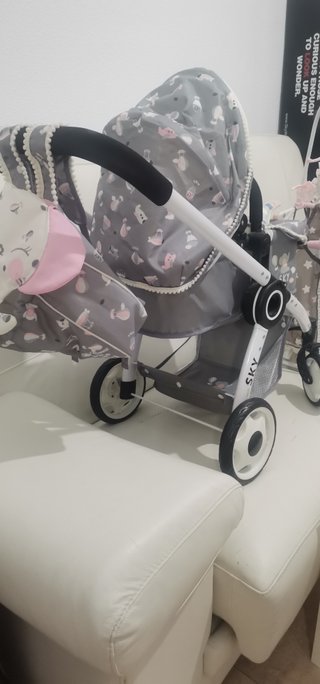 Carro y cuna de muñecas