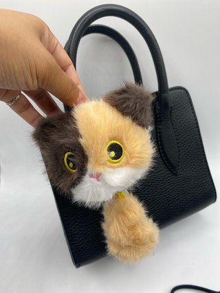 Peluche gato calicó con pompón