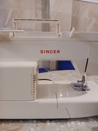 Máquina de coser Singer con pedal