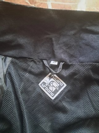 Chaqueta pantalones y protector zapatos tucano