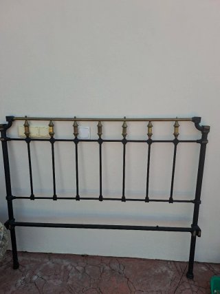 Testata antica in ferro battuto