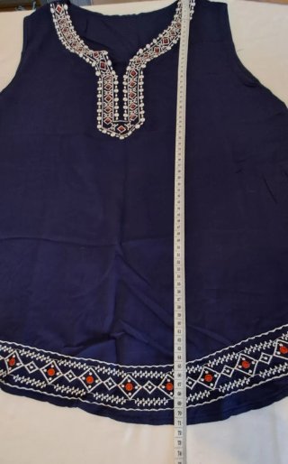 Top tipo túnica azul marino sin mangas T.L