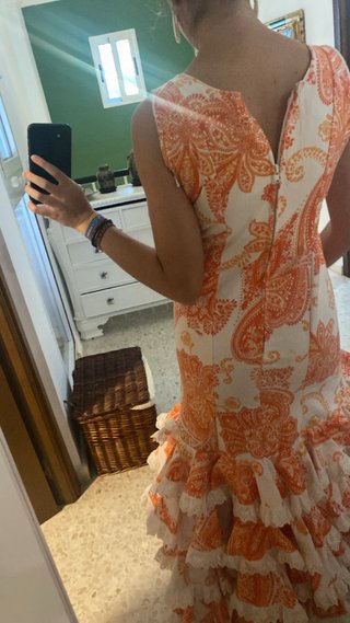 Traje de flamenca naranja y blanco