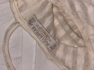 Jersey de rayas beige con encaje