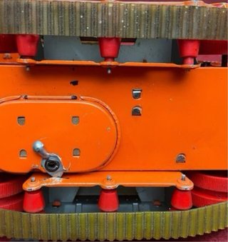 Tractor hojalata  a batería de juguetes Nomura TN