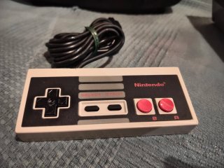 Nintendo NES con TV Trinitron y Mario Bros