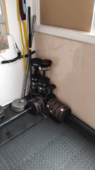 Discos de pesas de cemento,más barras.