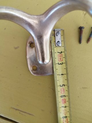 Colgador doble metal dorado
