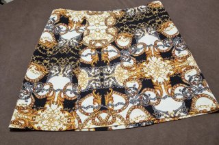 Falda estampada dorada y negra