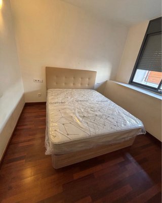 Cama canapé beige y marrón