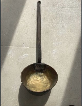 Cazo antiguo de metal