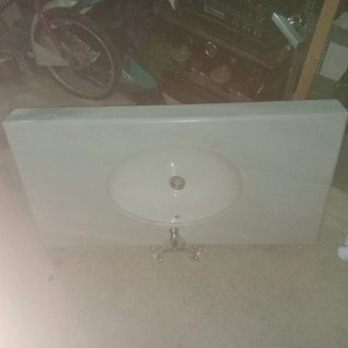 Lavabo de mármol y porcelana blanco