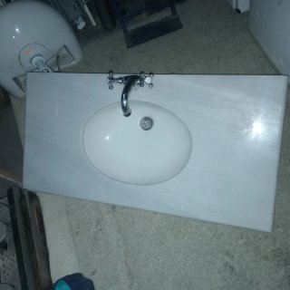 Lavabo de mármol y porcelana blanco