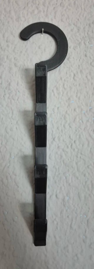 Percha para gorras negra