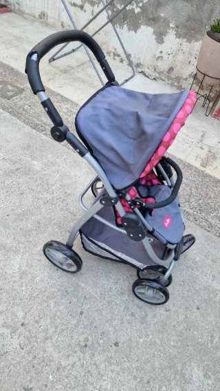 Cochecito de juguete para muñecas
