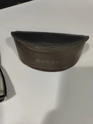 Gafas de sol Gucci negras y marrones
