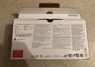 PSP Slim + scatola + base + schede + cavi per TV