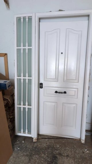 Puerta de entrada hierro fundido lacada