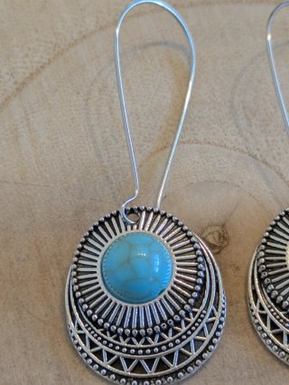 Pendientes colgantes plateados con turquesa