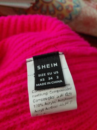 Jersey rosa hombro descubierto