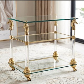 Mesa auxiliar cristal y latón con caballos