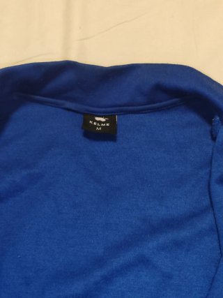 Chaqueta Kelme azul y amarilla Talla M